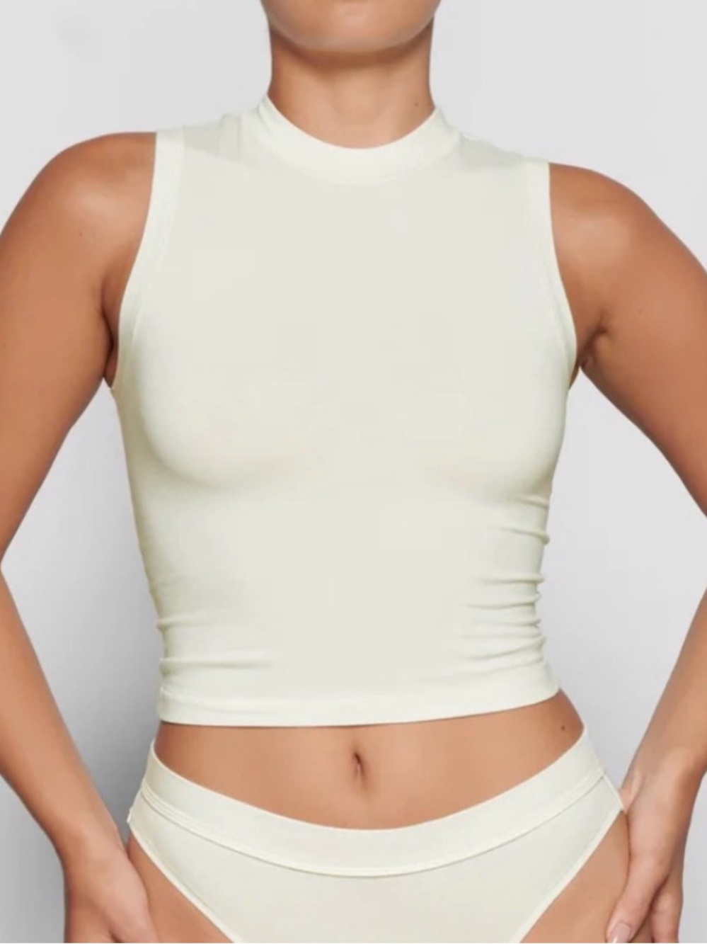 SKIMS Sleeveless Mock Neck Crop Tank Top in Bone